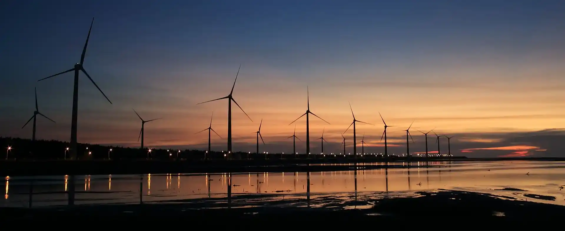Wind turbines in Alaskan sunset